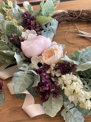 Artificial Lilacs, Peonies, and Snapdragons on a Grapevine Wreath
